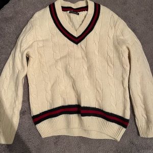 Cream oversized V neck sweater with red and navy trim